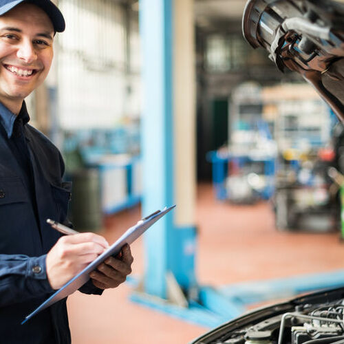 A Mechanic Goes Over Safety Inspection Checklist.