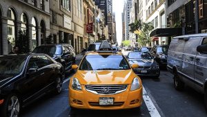 a photo of a taxi cab in traffic